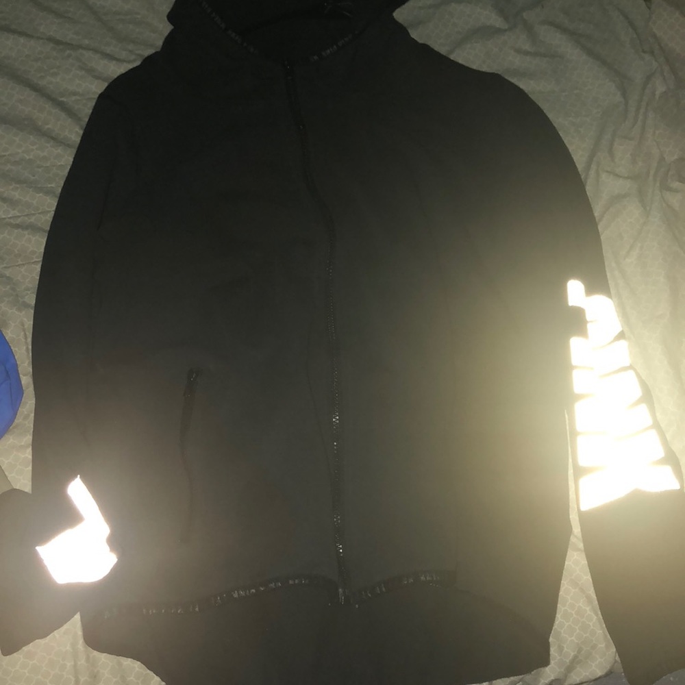 Black reflective zip up sweater